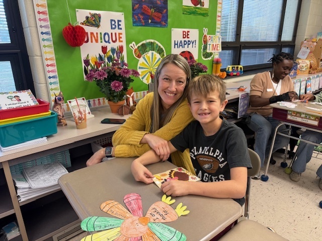 A student enjoying the event with their special quest.