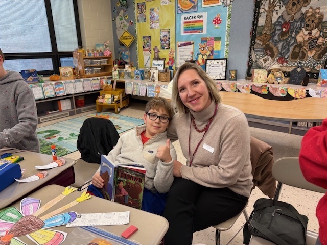 A student enjoying the event with their special quest.