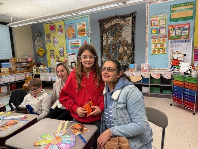 A student enjoying the event with their special quest.