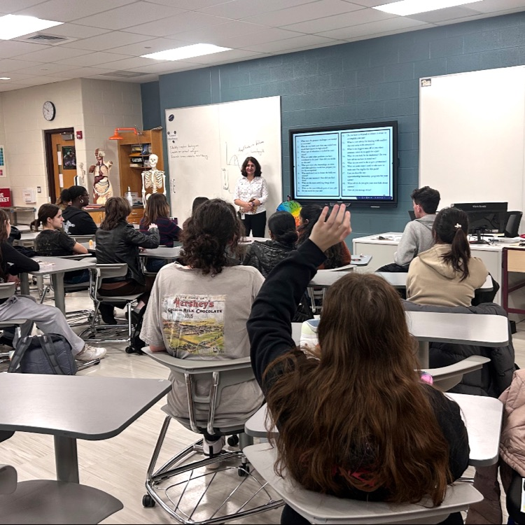 Dr. Maria providing students in the medical club insights to what she does  