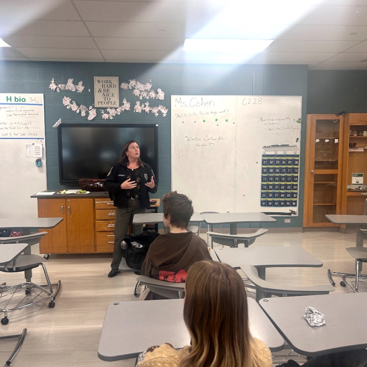 Detective Cartwright telling students about her career  
