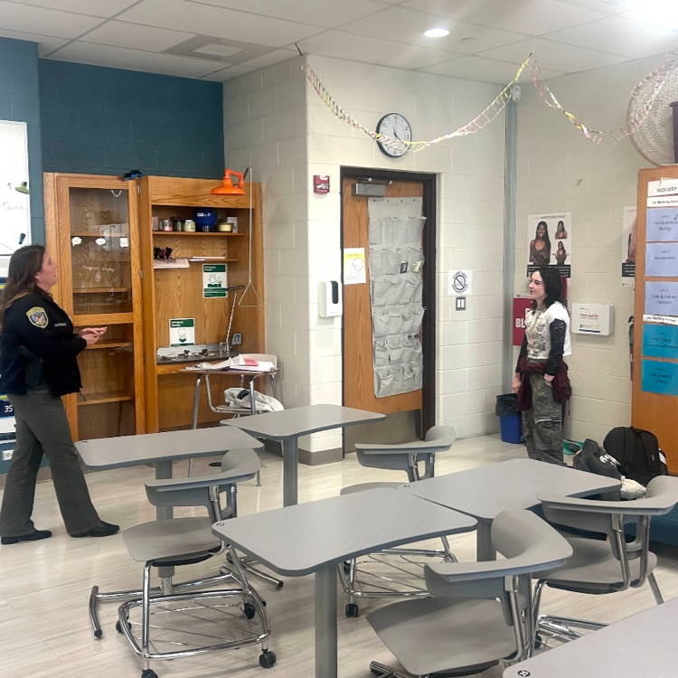 Detective Cartwright answering a students question