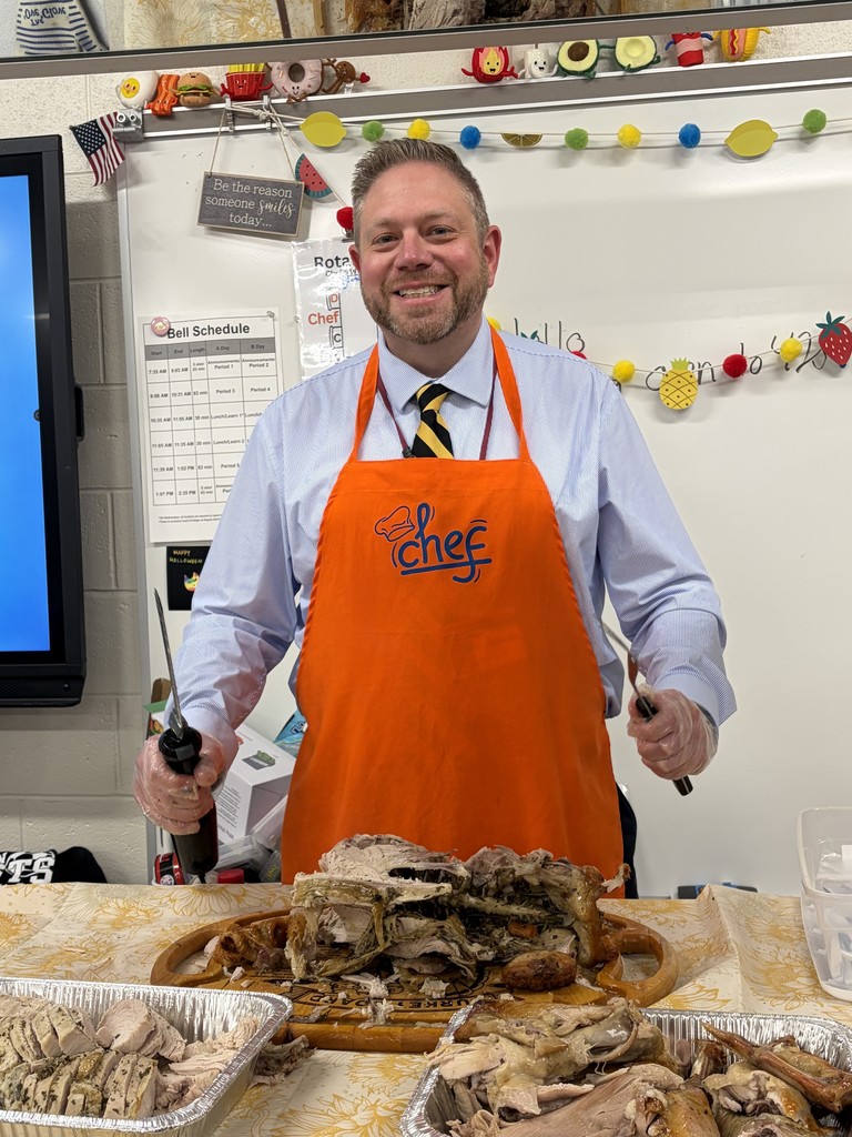 Dr. Fecher carving the turkey