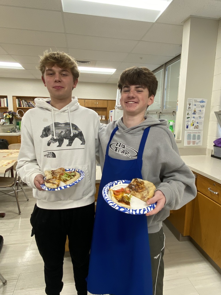 students tasting meal