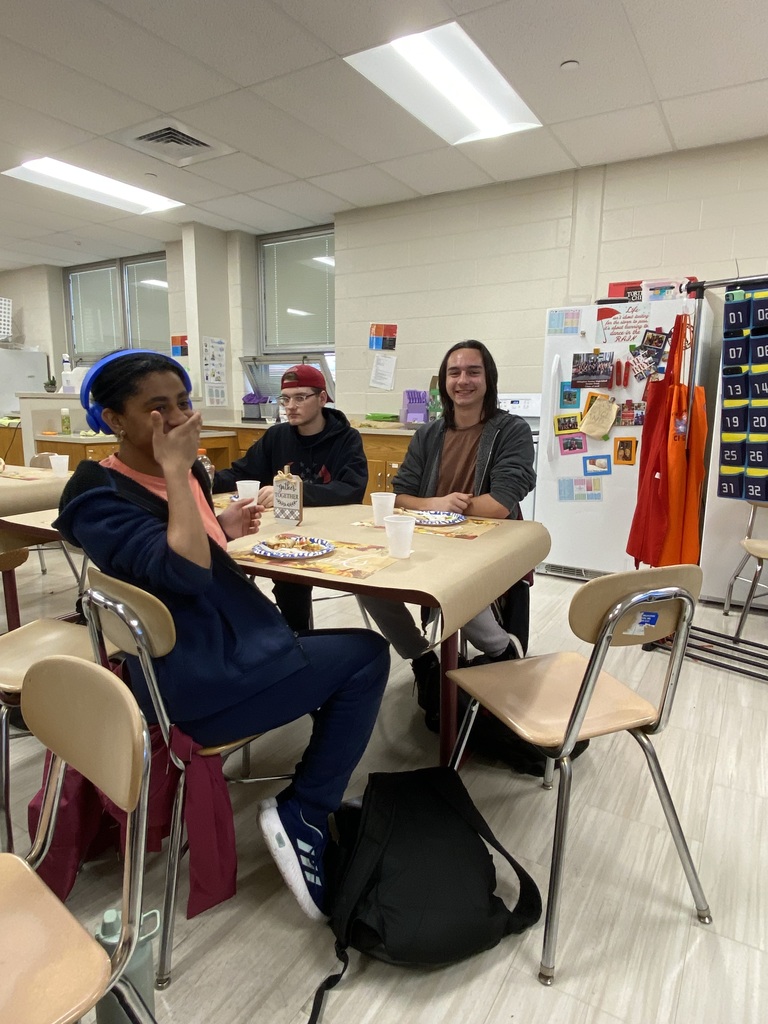 students enjoying pizza