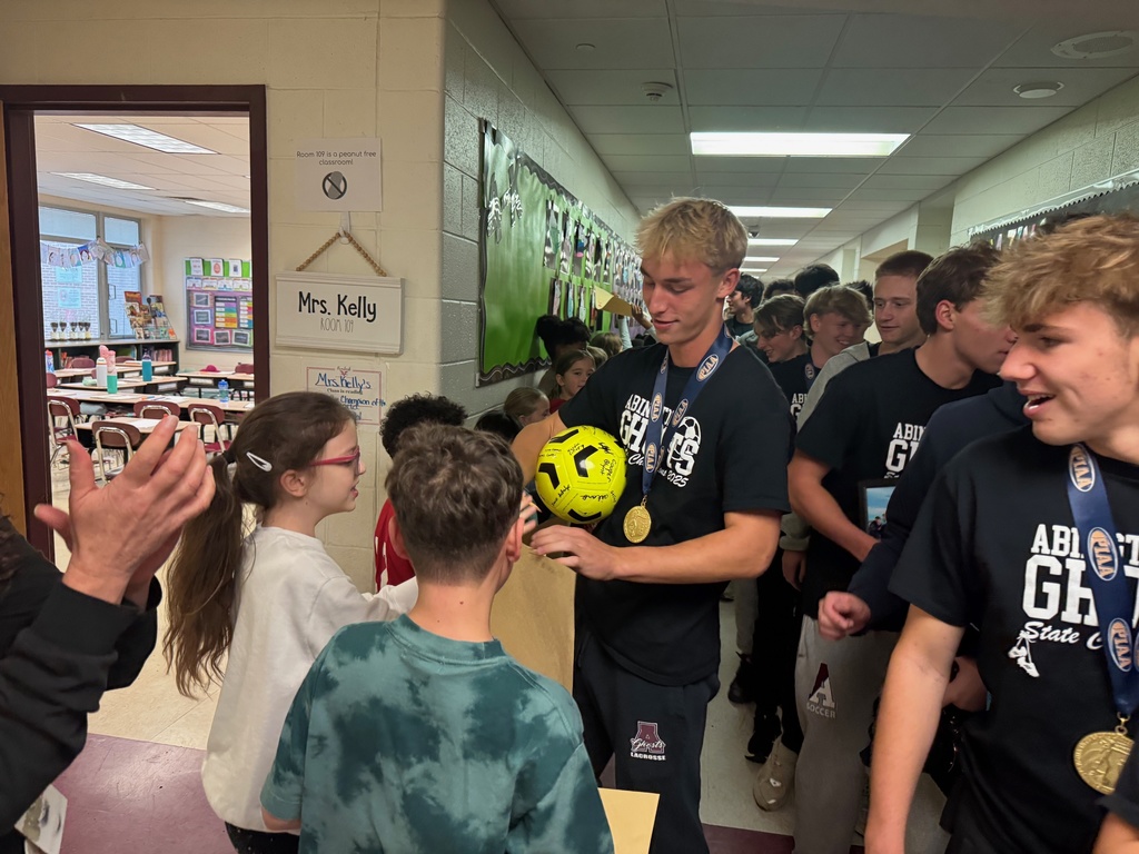 Soccer team signs authographs at Overlook