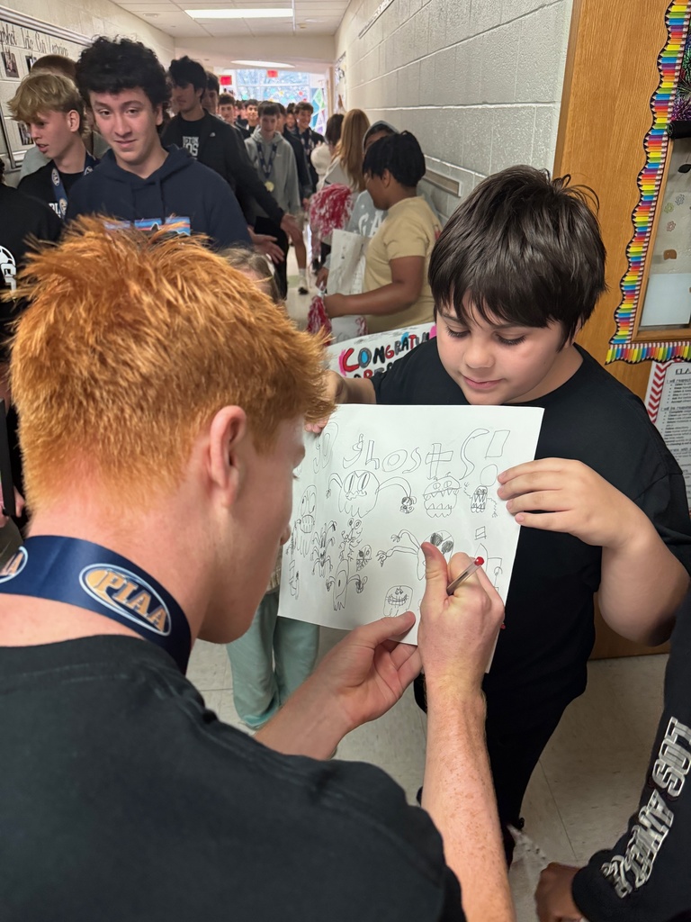 Soccer team signs autographs at Overlook