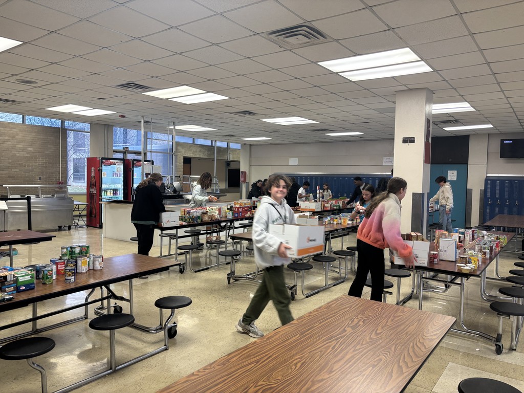 Student Council sorts food drive donations in the Commons