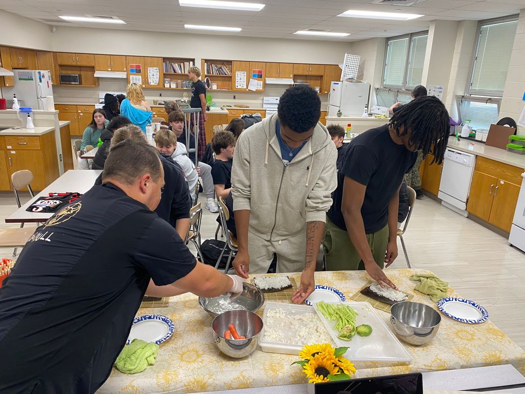 schindler and kids working