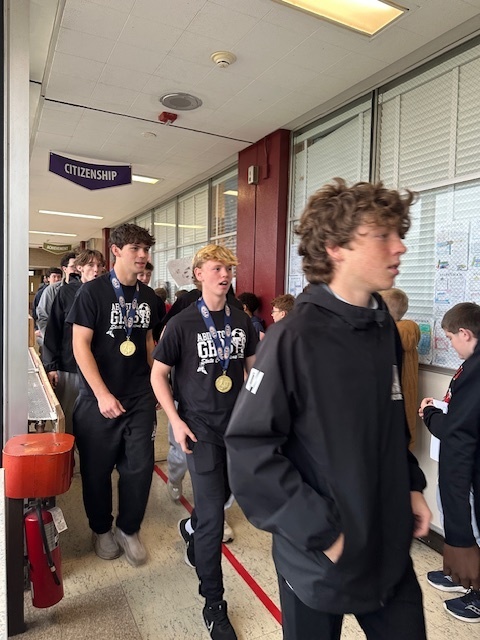 Image of Championship walk at the middle school for the high school soccer team 