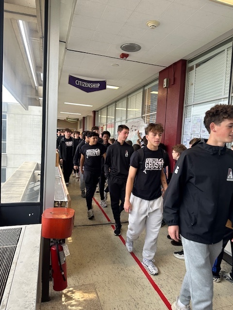 Image of Championship walk at the middle school for the high school soccer team 