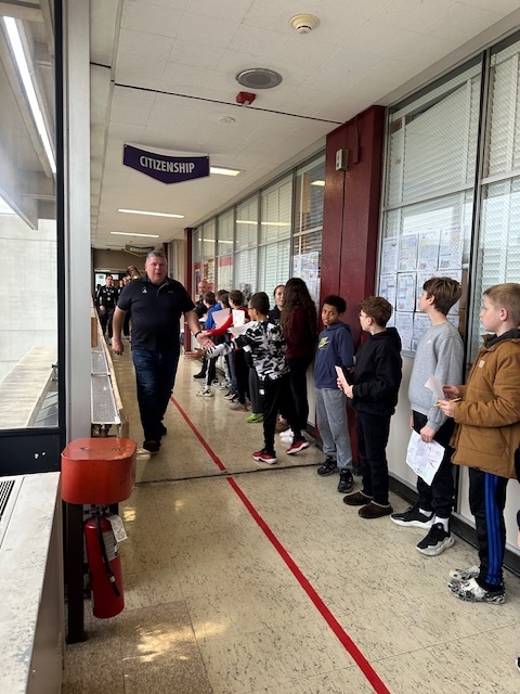 Image of Championship walk at the middle school for the high school soccer team 