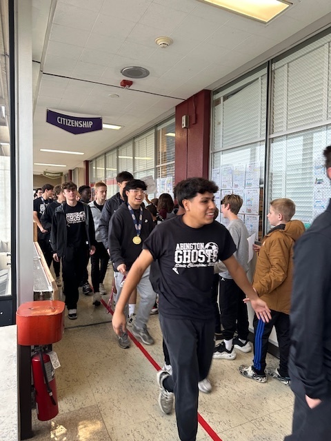 Image of Championship walk at the middle school for the high school soccer team 