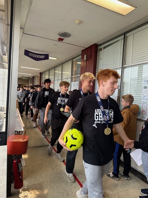 Image of Championship walk at the middle school for the high school soccer team 