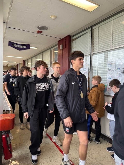 Image of Championship walk at the middle school for the high school soccer team 