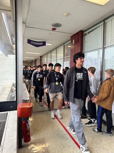 Image of Championship walk at the middle school for the high school soccer team 