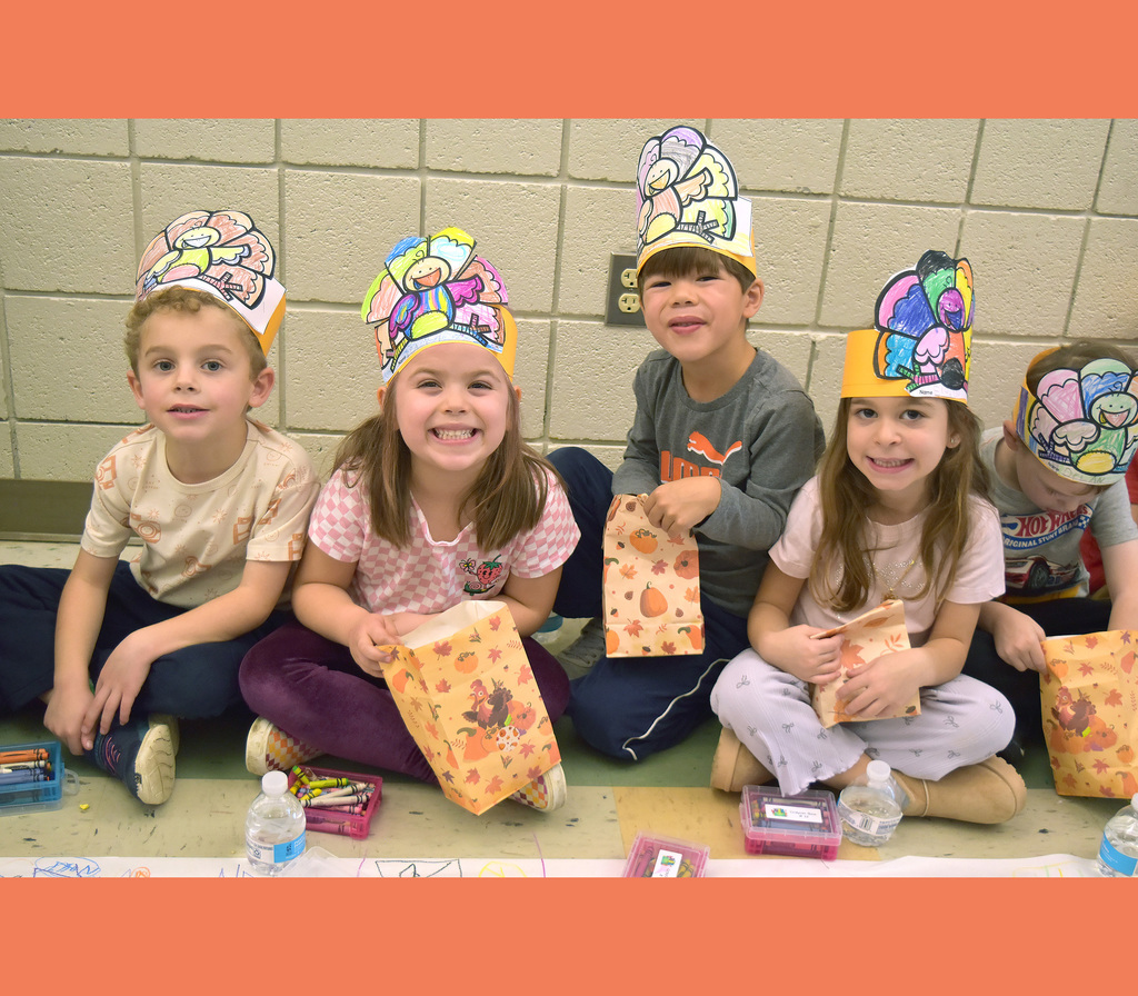 Kindergarteners smiling during their Friendsgiving