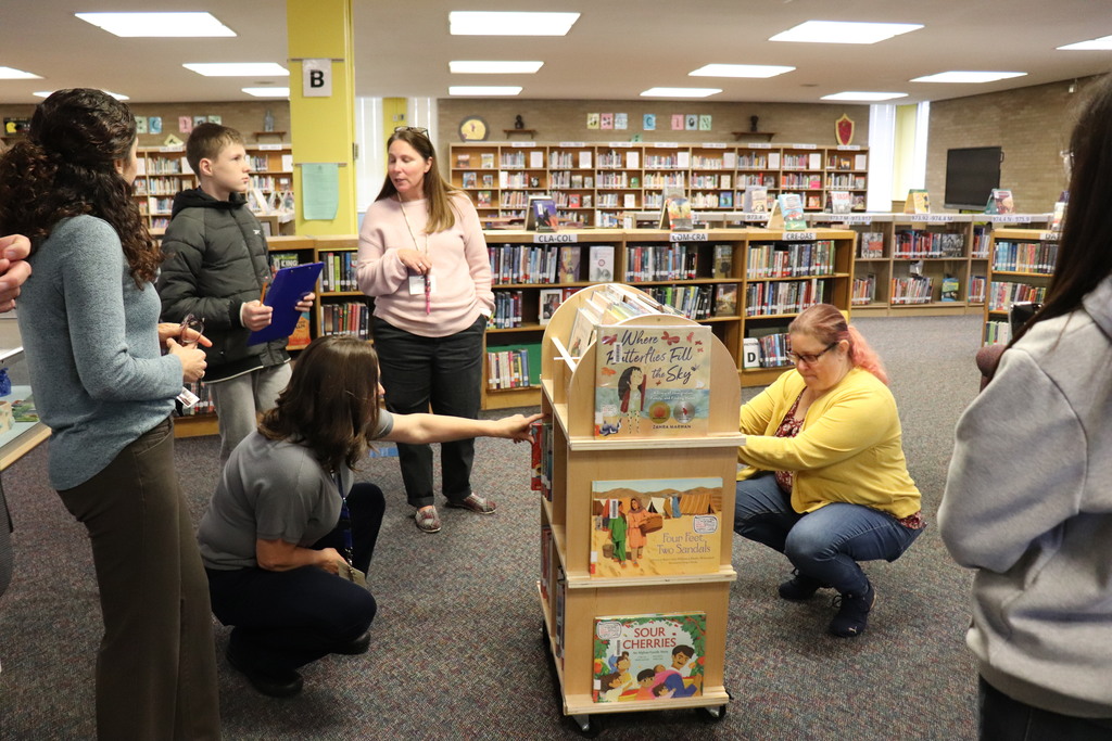 Students and teachers work on the activity together