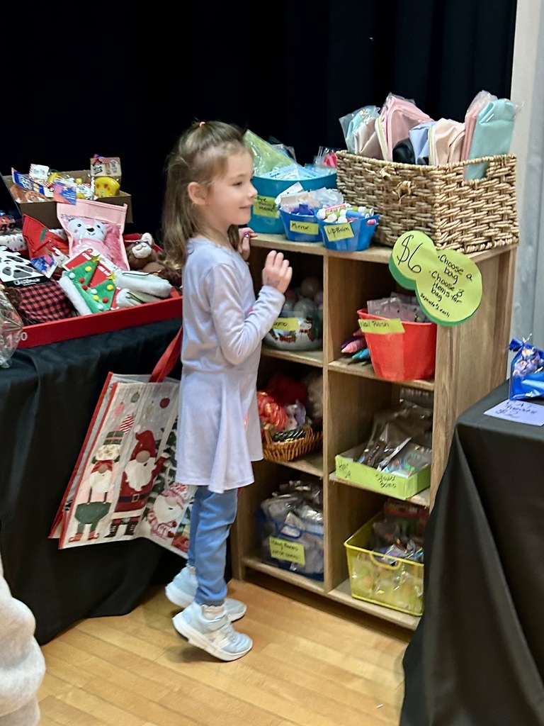 a students smiling and shopping