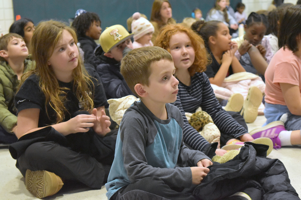 Copper Beech students listen to Peter Brown, author/illustrator of The Wild Robot Series