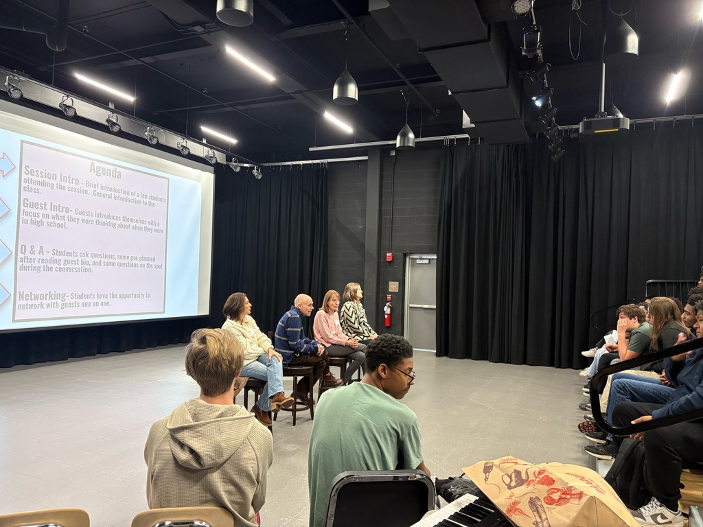 panel speaking to students