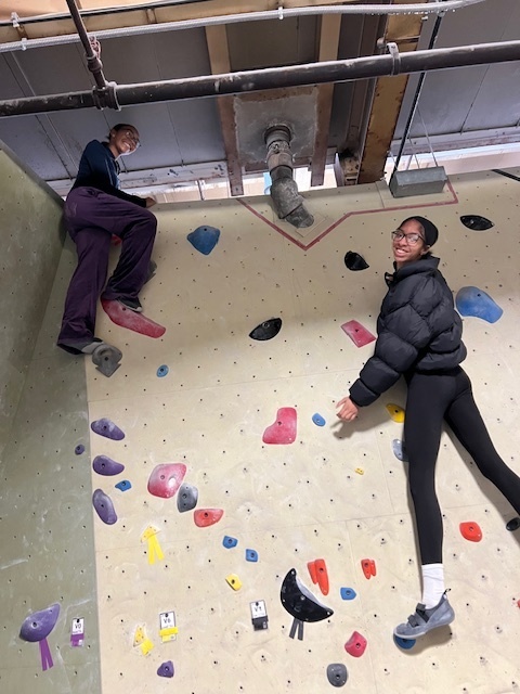 students climbing