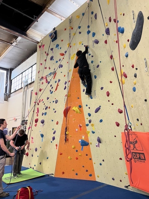 students climbing