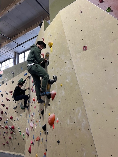 students climbing