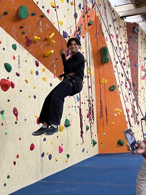 students climbing