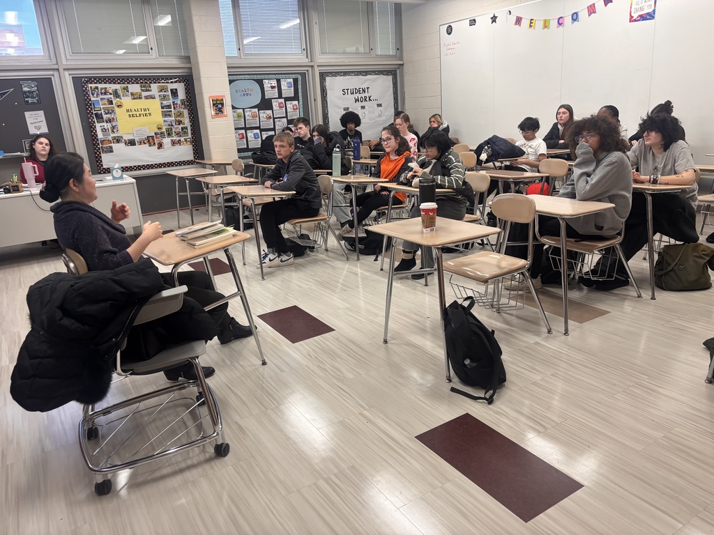 Woman educating students