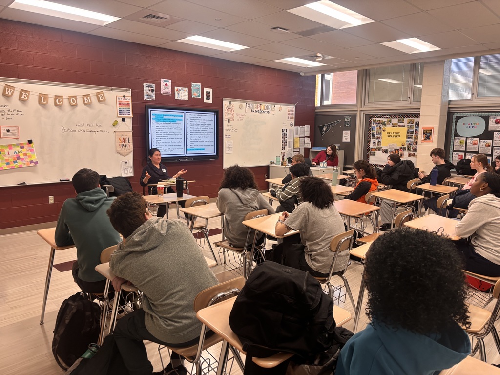 Woman educating students