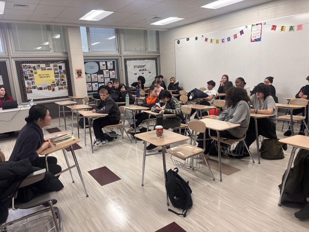 Woman interacting with students