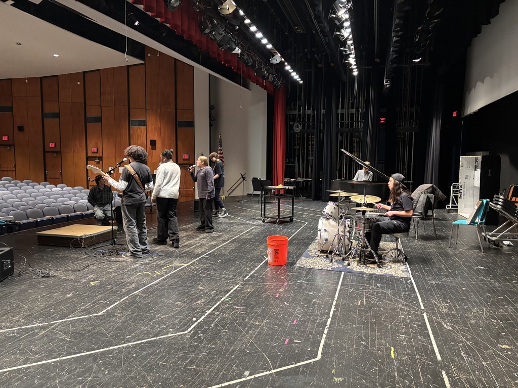 Image of students rehearsing for concert.