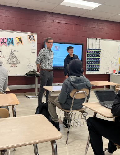 Dr. Eckenrode speaking with students