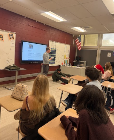 Dr. Eckenrode speaking with students