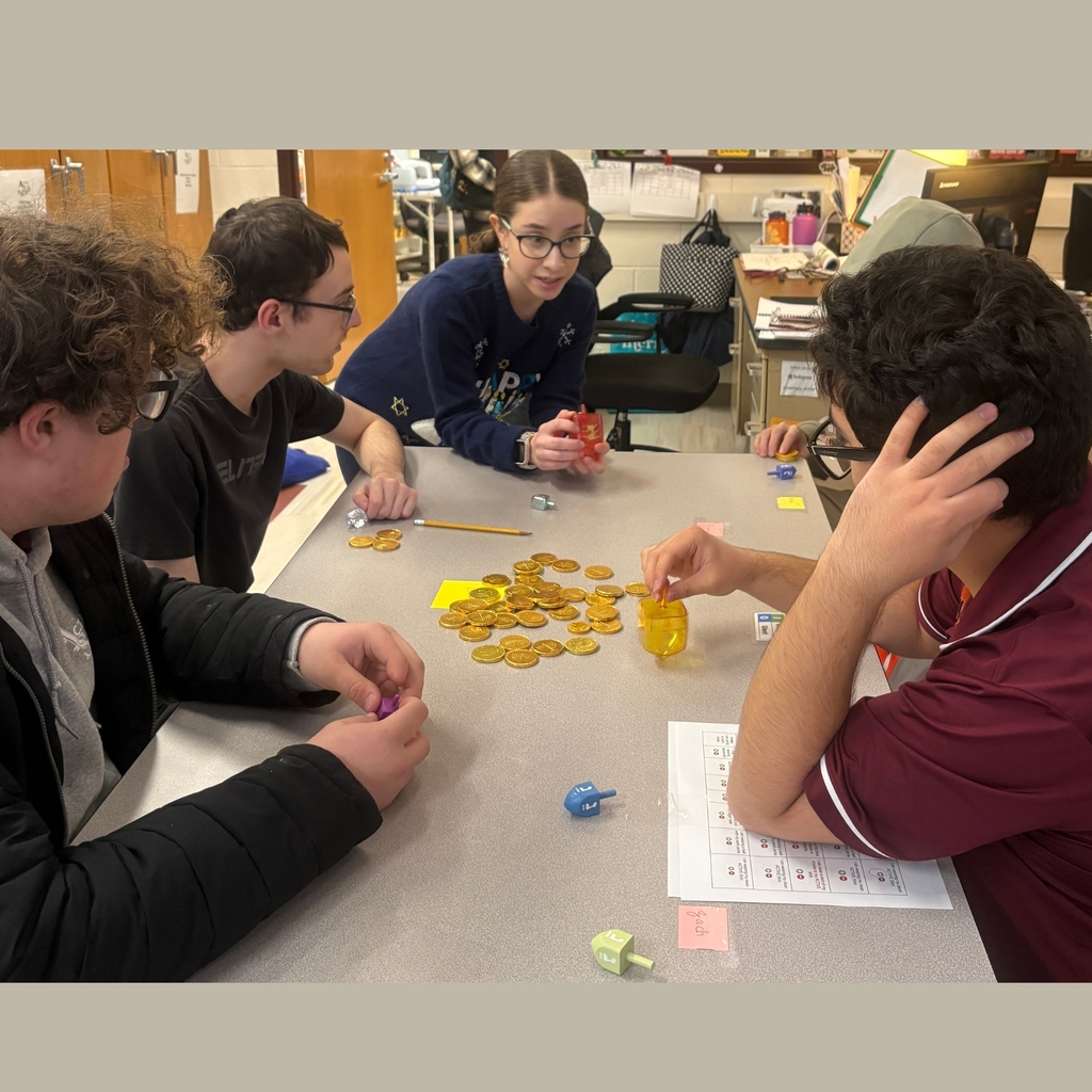teaching how to play dreidel