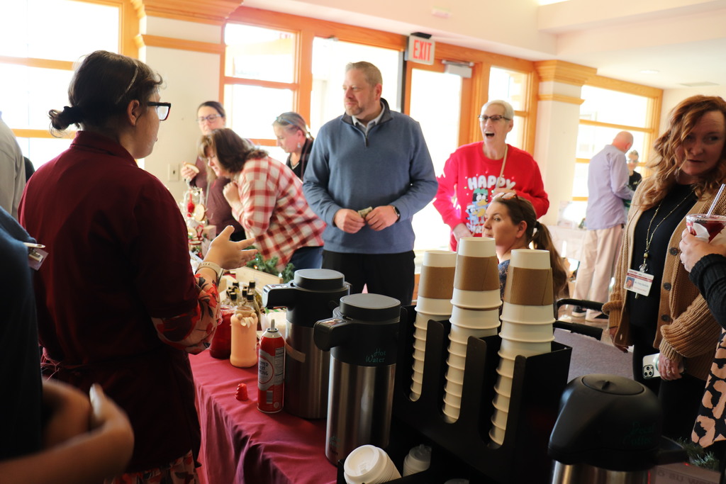 Administration building employees shop at the ACTIVE/STRIVE holiday pop-up. 