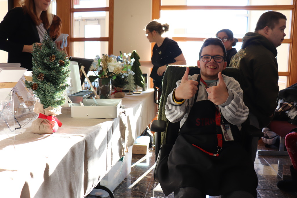 Administration building employees shop at the ACTIVE/STRIVE holiday pop-up. 