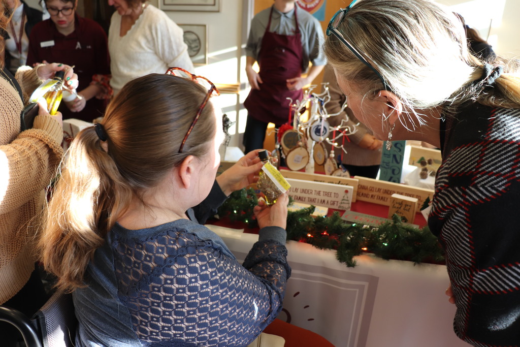 Administration building employees shop at the ACTIVE/STRIVE holiday pop-up. 