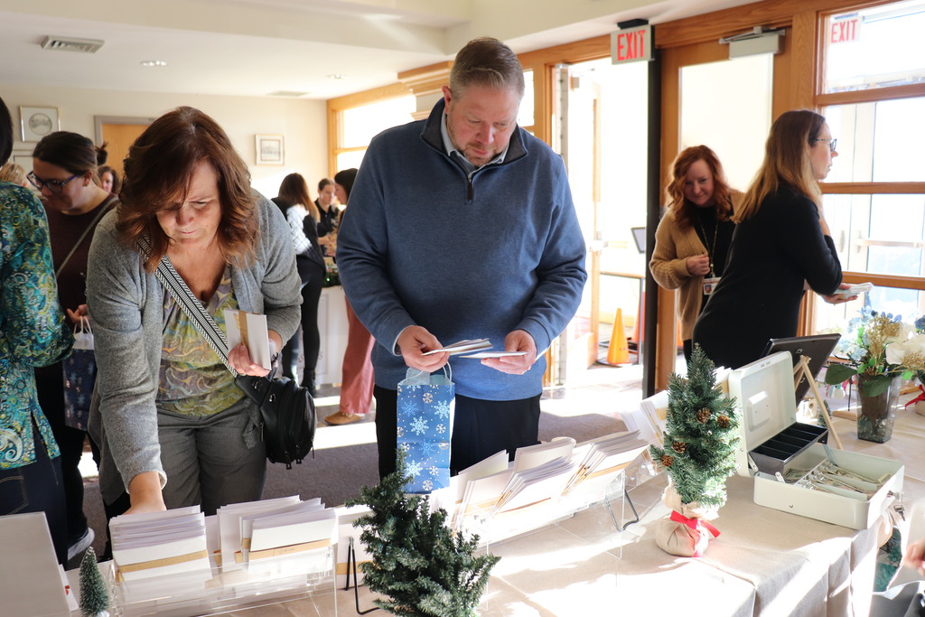 Administration building employees shop at the ACTIVE/STRIVE holiday pop-up. 
