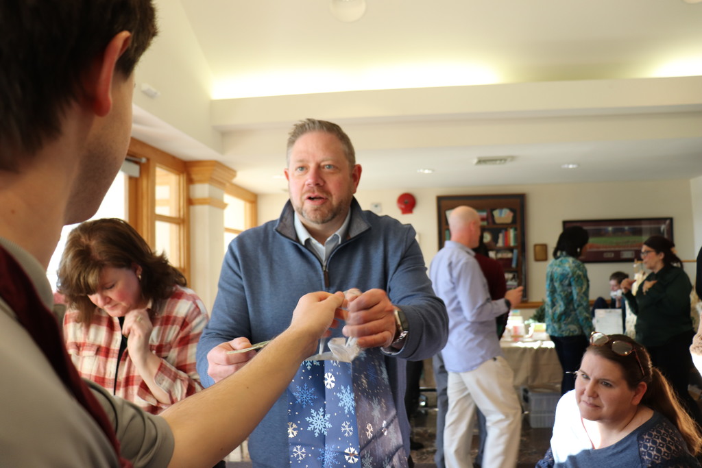 Administration building employees shop at the ACTIVE/STRIVE holiday pop-up. 