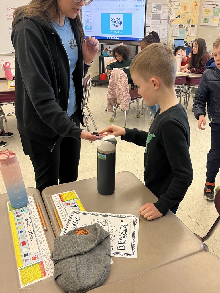 students touching a bug
