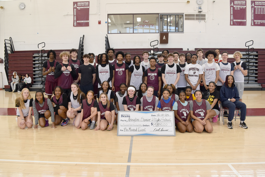 Abington Senior High School students pose with a check for $4,850 from Fred Beans Mazda of Abington, from their test drive fundraiser event.