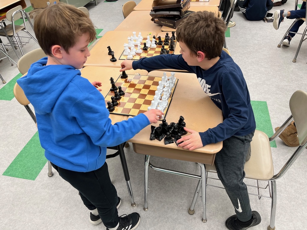 Students playing chess