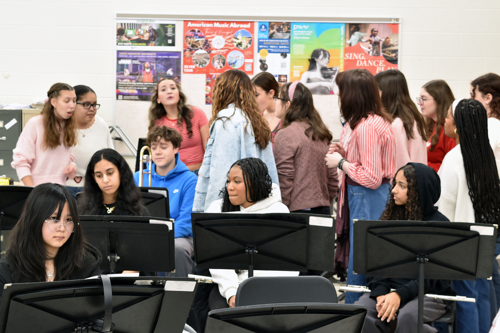 Students singing Valentine grams to fellow students