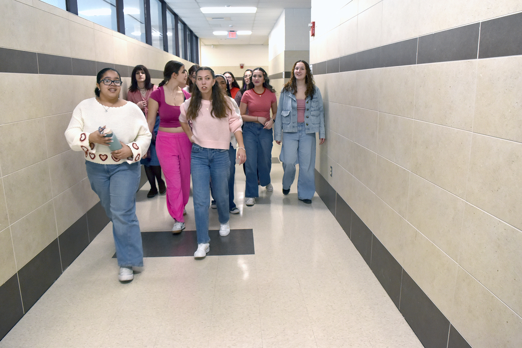 Students singing Valentine grams to fellow students