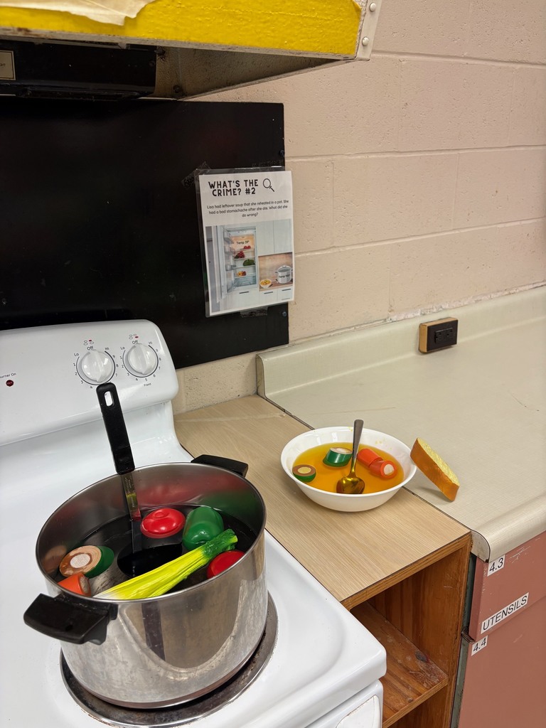 Image of 7th grade Personal Development students put on their best detective hats to investigate "Food Crimes"