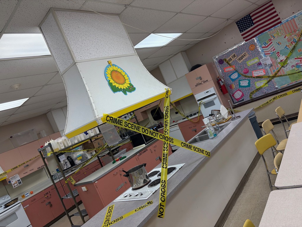 Image of 7th grade Personal Development students put on their best detective hats to investigate "Food Crimes"