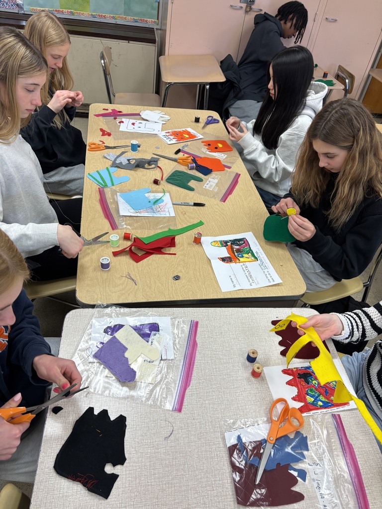 Image of 8th grade students are in the midst of the fan-favorite "Felt Monster Project" 