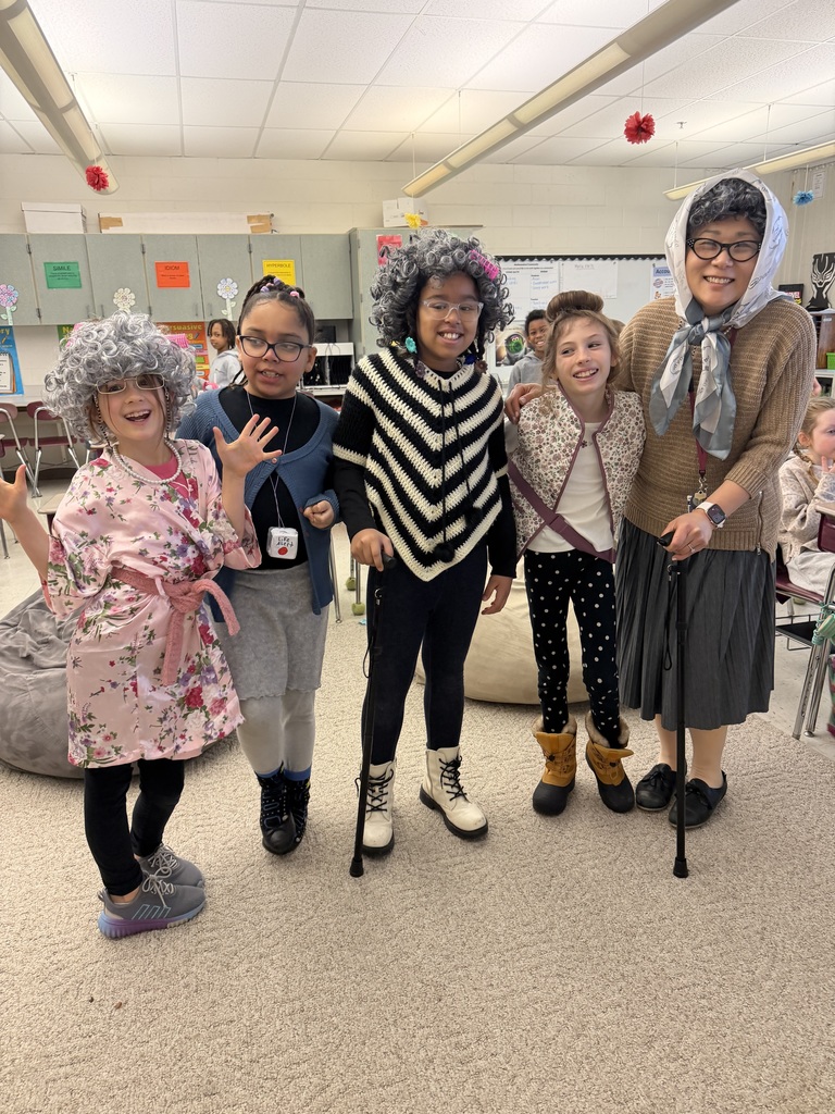 students smiling on the 103 day of school